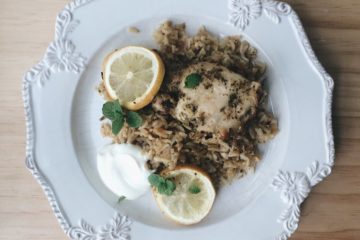 Greek Style Chicken and Rice on a white plate