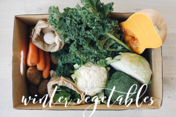 winter vegetables in a large cardboard box