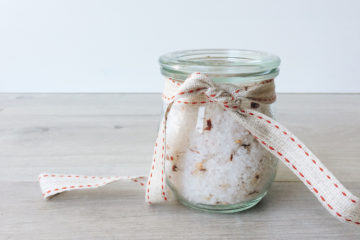christmas spiced salt in a small weck jar with a red and white ribbon