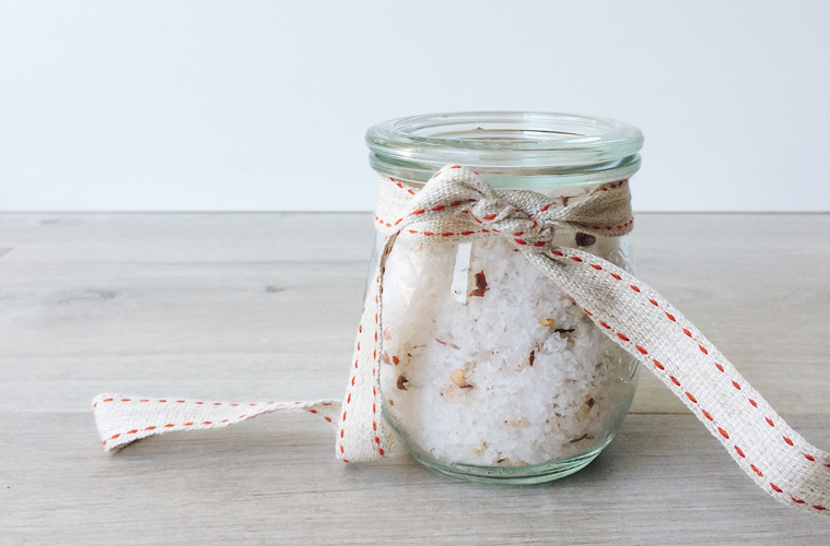 christmas spiced salt in a small weck jar with a red and white ribbon