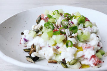 vibrant cottage cheese on a white plate