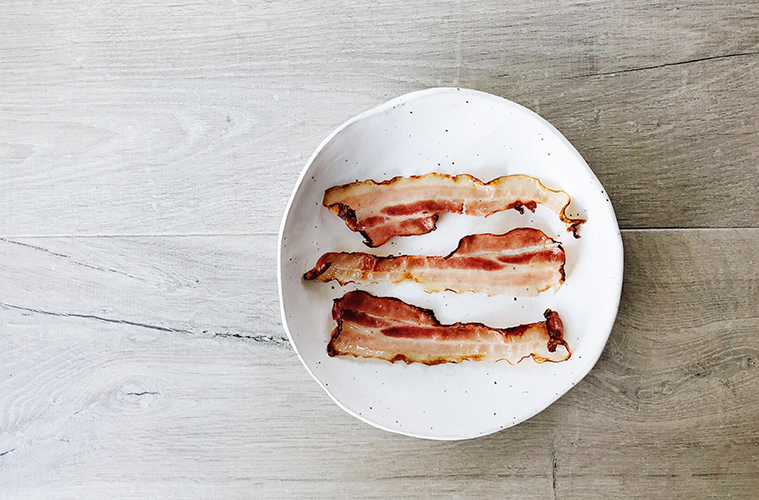 bacon on a white plate