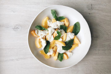 peaches and mozzarella salad_cover on a white plate