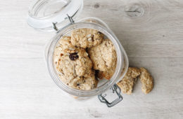 yoga biscuits in a jar overhead on a wooden surface