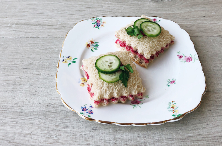 beetroot hummus sandwiches on a high tea plate
