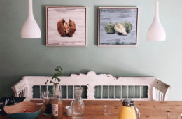 walnut and artichoke paintings on the wall