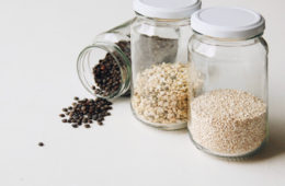 lentils, mung beans and quinoa in glass jars